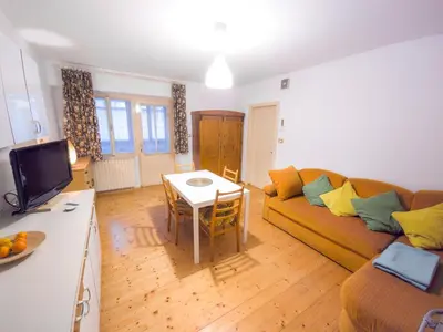 a living room with a couch and a table at Apartma Florent in Bovec