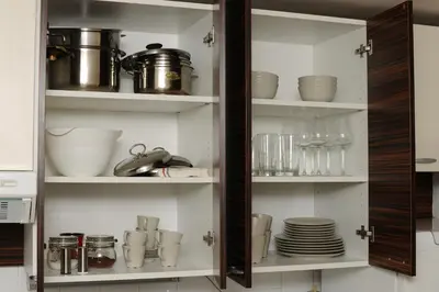 a kitchen pantry with dishes and utensils at Jojo apartment in Ljubljana