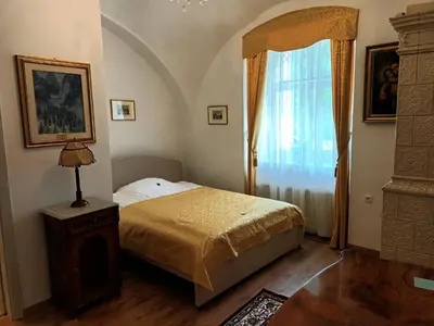 a bedroom with a bed and a window at Rezidenca Sv. Peter in Malečnik