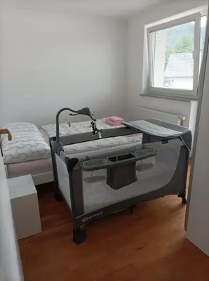 a hospital bed with a sink in a room at RELAX in Kamnik