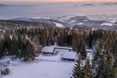 an aerial view of a house in the snow at Apartment Zarja - Trije Kralji in Zgornja Ložnica