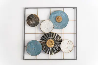 a group of plates on a rack on a wall at Apartma Tim Terme Čatež in Čatež ob Savi