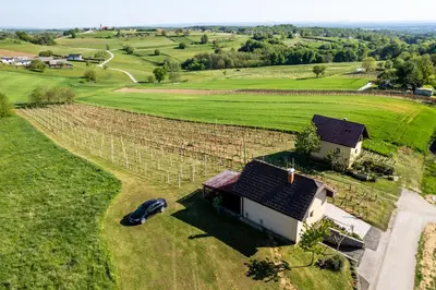 an aerial view of a house in a field at APARTMA ENI in Moravske Toplice