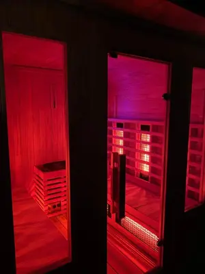 an open door with red lights in a room at Apartmaji Paletino in Turjak