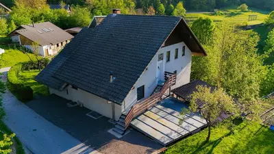 an overhead view of a white house with a roof at Secret Paradise apartment in Zgornje Gorje