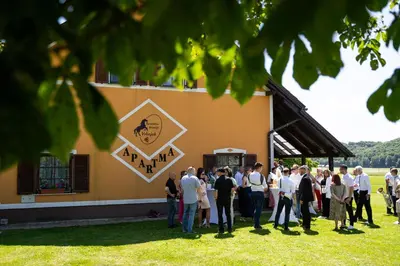 a group of people standing outside of a building at Apartments - Turistična kmetija Vrbnjak in Ljutomer