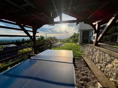 a solarium with a view of the sky at Elipa Cottage in Cerklje na Gorenjskem