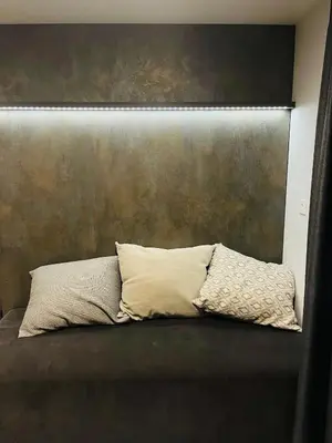 a bed with two pillows on top of it at Nord mobile house in Velenje