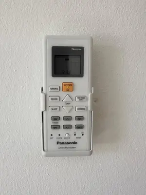 a cell phone is attached to a wall at Apartma Anže Samec in Dobravlje