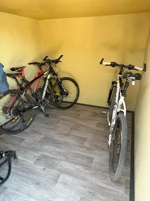 two bikes parked against a wall in a room at Apartma Anže Samec in Dobravlje