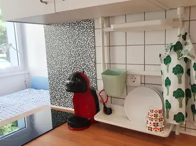 a toy bathroom with a toilet in a doll house at Happy Vibes apartment, charming & with free parking in Ljubljana