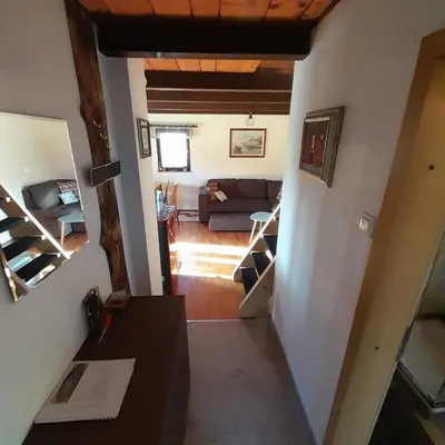 a view of the living room from the loft at Počitniška hiška pri Lipi in Dramlje