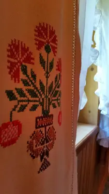 a painting of a flower pattern on a wall at Počitniška hiša Ukanc in Bohinj