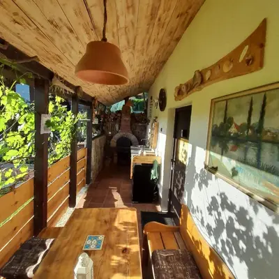 a view of the porch of a house at Apartma Lavanda in Dramlje