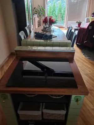 a living room with a couch on a table at Apartment Baci for 4 guests in Ljubljana