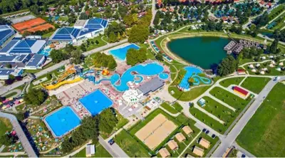 an overhead view of a water park with two pools at Green Sky House in Mostec