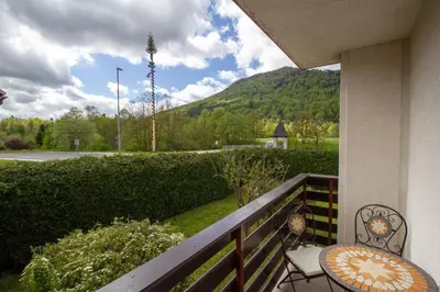 a balcony with a view of a mountain at Apartma pri Klari in Kočevje