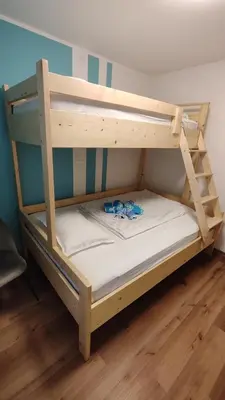 a couple of bunk beds in a room at Apartment Irena Bovec in Bovec