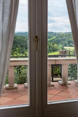 a view from a door looking out at a balcony at Herga Wine Estate - Old lady - Holiday Home in Ivanjkovci