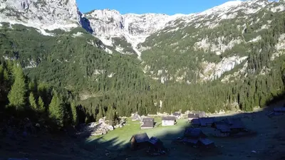 an aerial view of a mountain with a group of chairs at Hiška Henrik Zalokar in Bohinj