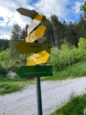 a street sign on the side of a road at Apartma Adrian in Kranjska Gora