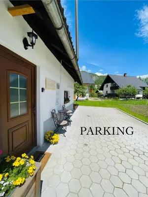 a patio outside of a house with a door at Studio Barbara in Bohinj