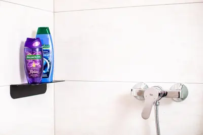 a tube of toothpaste on a shelf in a bathroom at Apartma 21 - Ajda in Bovec