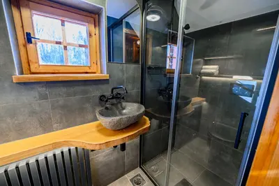 a bathroom with a sink and a shower at Relax house AVUS with Sauna in Slappe dʼIdria