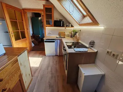 a small kitchen with a sink and a stove at Apartment Ursa Major in Preddvor