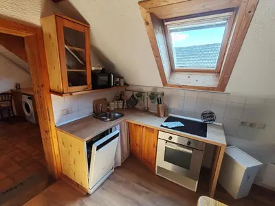 a small kitchen with a sink and a stove at Apartment Ursa Major in Preddvor