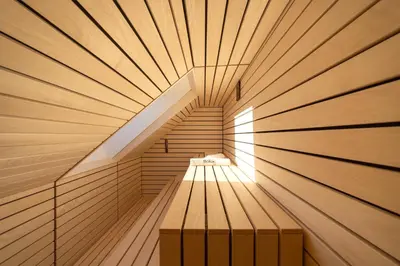 a sauna with a bench in the middle at House Natura Savica in Bohinj