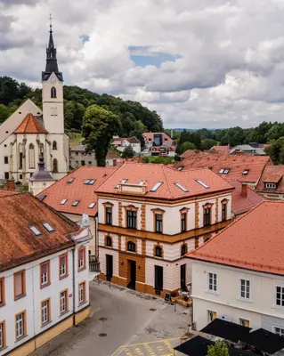 an aerial view of a town with a church at GRAND CENTRAL LJUTOMER in Ljutomer