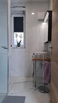 a kitchen with a sink and a window at Downtown Delight in Ljubljana