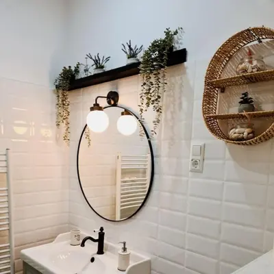 a bathroom with a sink and a mirror at Oldie goldie in Maribor