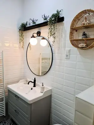 a bathroom with a sink and a mirror at Oldie goldie in Maribor