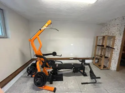 a room with an orange exercise bike in it at Resort Franko Spacious house with a pool in Obrov