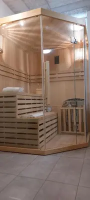a room with a large wooden structure with a room at Apartment with a view in Dobravlje