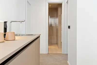 a bathroom with a sink and a shower at Bugabu Ljubljana in Ljubljana