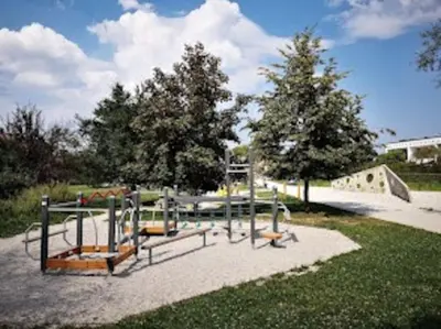 a park with a playground with a slide at Dreamy nature apartment near city-family friendly, FREE parking in Ljubljana