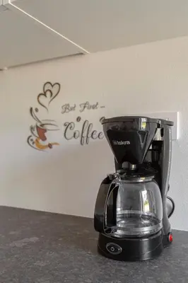 a coffee maker sitting on top of a counter at Apartma Lajf in Brežice
