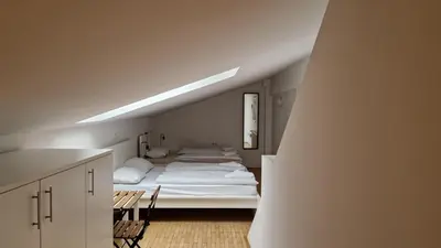 a room with a bed in the middle of it at Ljubljana rest nest in Ljubljana