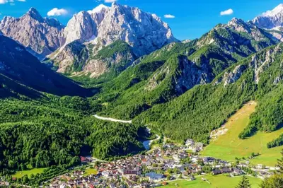 an aerial view of a village in the mountains at Cottage Žirovnica in Žirovnica