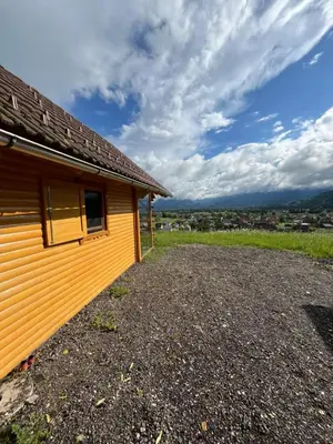 a building with a window on the side of it at Cottage Žirovnica in Žirovnica