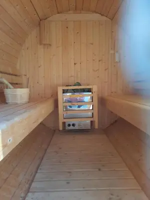 an inside of a sauna with wooden walls at Cottage of peace, Ljubljana area in Rakitna