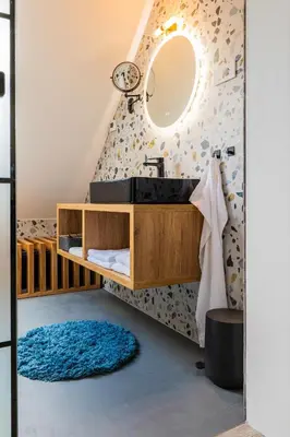 a bathroom with a sink and a mirror at Arnold's Nest in Kotlje