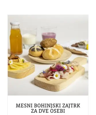 a table with three plates of food and drinks at apartma Lesnik Vila Ziba in Bohinj