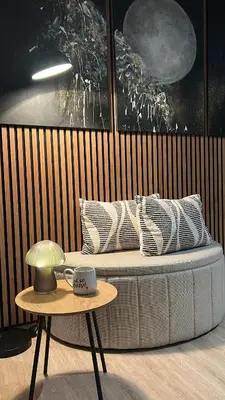 a coffee table with a cup on top of a couch at Midnight Villa in Cerkvenjak