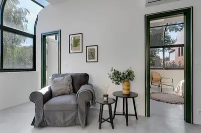 a living room with a couch and a table at Apartments Mazijeva in Ljubljana