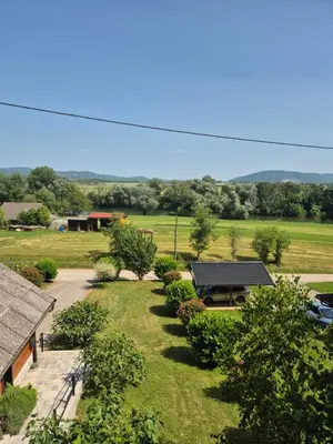 an overhead view of a garden with a building at RELAX HOUSE Kolpa view Podzemelj in Gradac