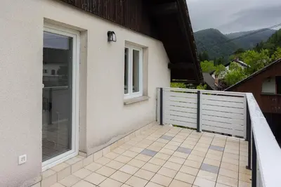 a balcony of a house with a fence at Apartment Erika in Bled